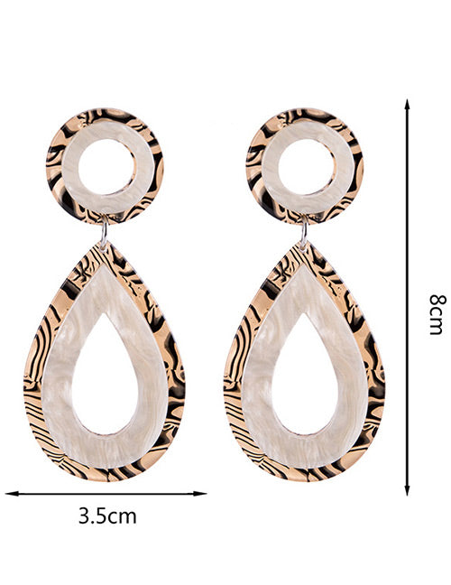 Modern Silver Teardrop Statement Earrings