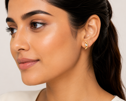 Golden Wave Crystal Stud Earrings – Modern Designer Earrings for Women