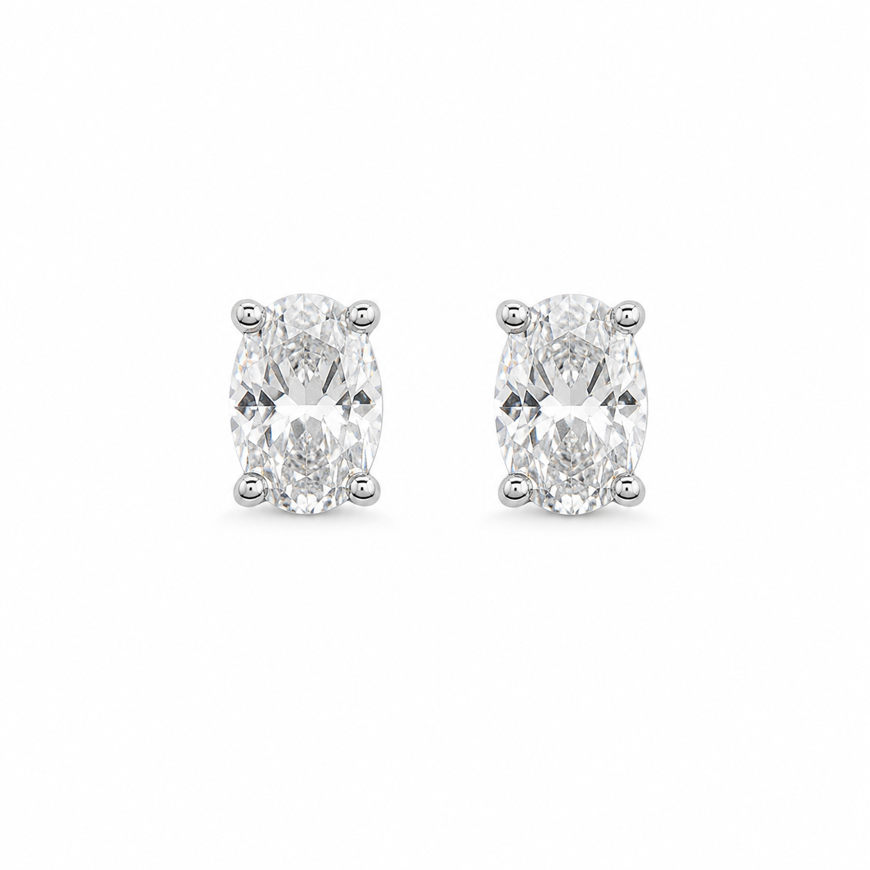 Oval Solitaire Crystal Stud Earrings – Classic Silver-Tone Elegance